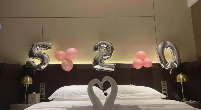 Bed in Echarm Plus Hotel Changsha High-speed Railway South Station Desiqin