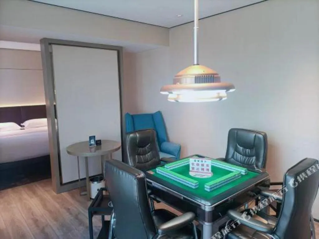 Bed in Echarm Plus Hotel Changsha High-speed Railway South Station Desiqin