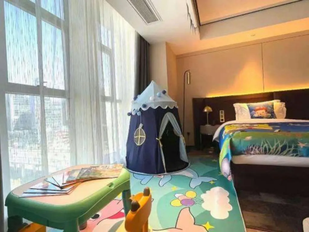 Bed in Echarm Plus Hotel Changsha High-speed Railway South Station Desiqin