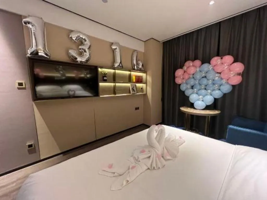 Bed in Echarm Plus Hotel Changsha High-speed Railway South Station Desiqin