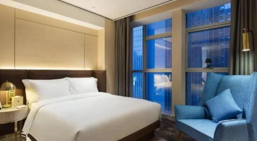 Bed in Echarm Plus Hotel Changsha High-speed Railway South Station Desiqin
