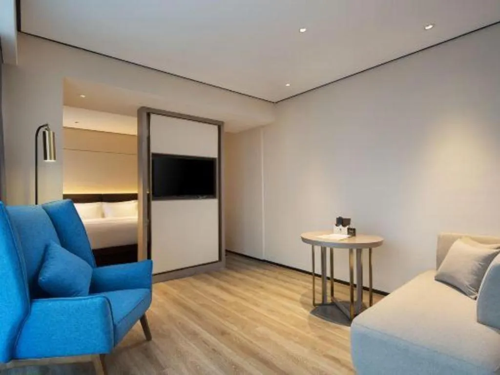 Bed in Echarm Plus Hotel Changsha High-speed Railway South Station Desiqin