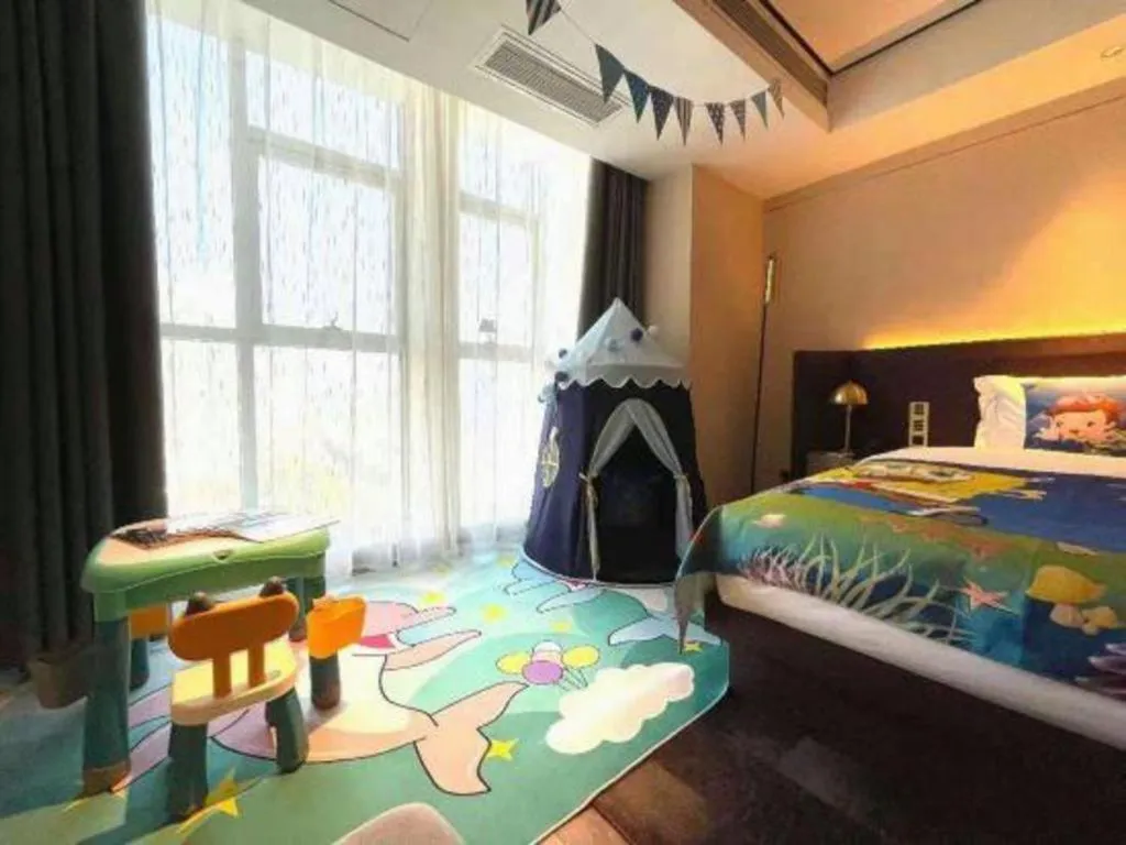 Bed in Echarm Plus Hotel Changsha High-speed Railway South Station Desiqin