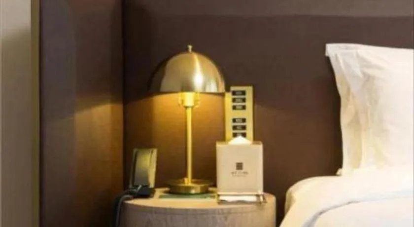 Bed in Echarm Plus Hotel Changsha High-speed Railway South Station Desiqin