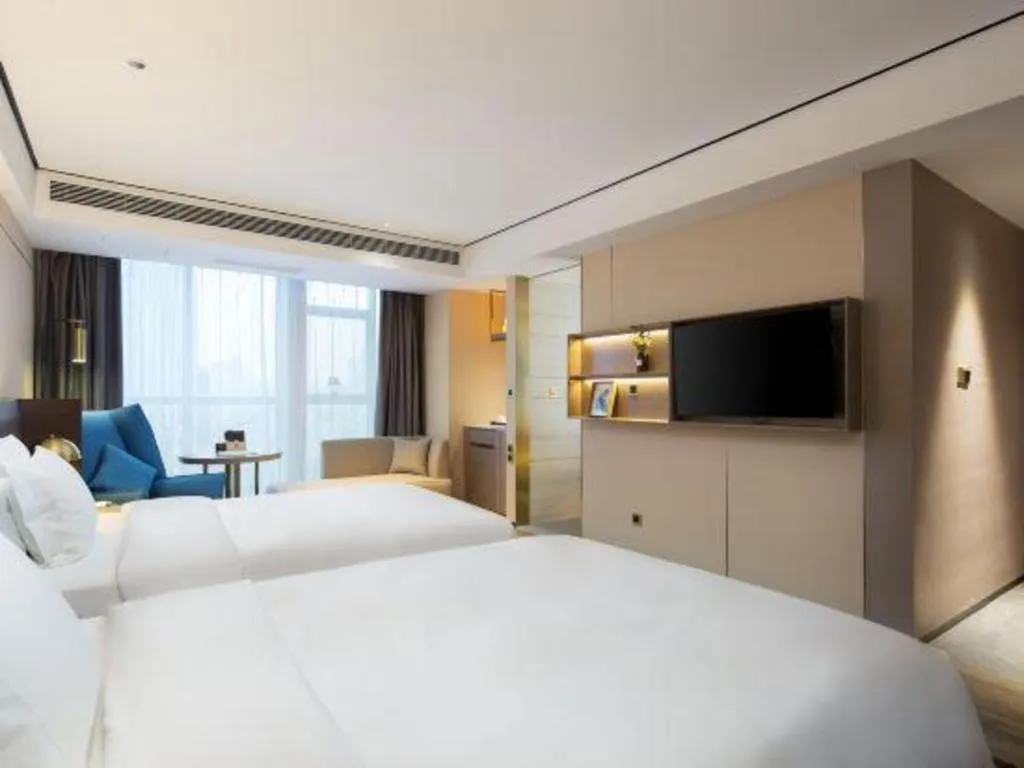Bed in Echarm Plus Hotel Changsha High-speed Railway South Station Desiqin