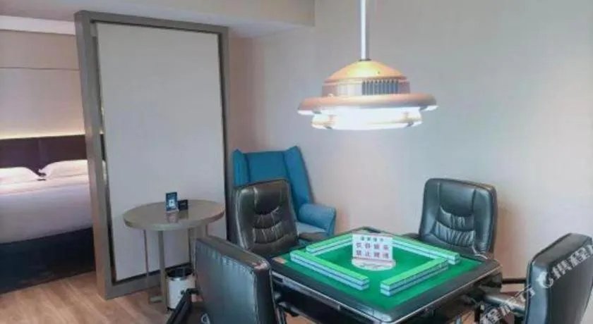 Bed in Echarm Plus Hotel Changsha High-speed Railway South Station Desiqin