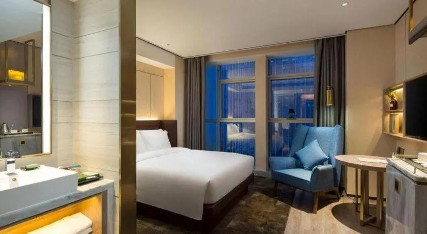 Bed in Echarm Plus Hotel Changsha High-speed Railway South Station Desiqin