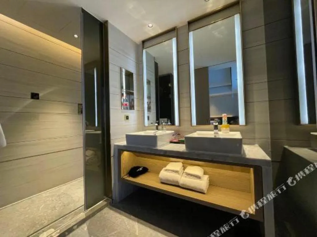 Bed in Echarm Plus Hotel Changsha High-speed Railway South Station Desiqin