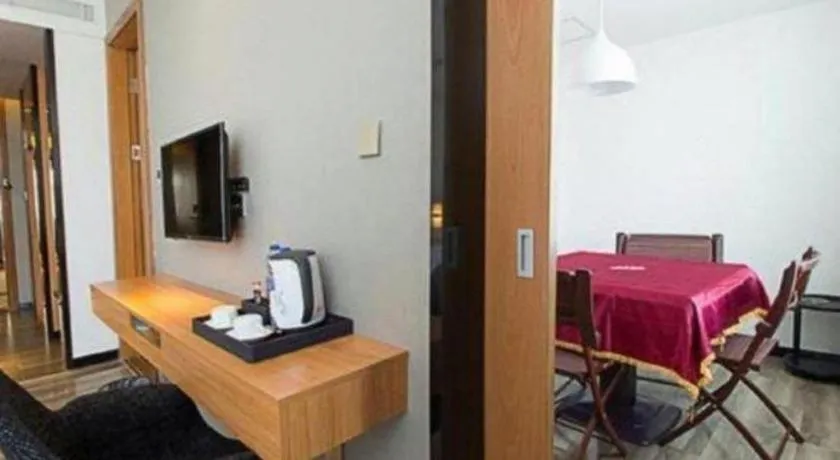 Bed in Borrman Hotel Jingzhou Jiangjin West Road Wanda Plaza Fantawild