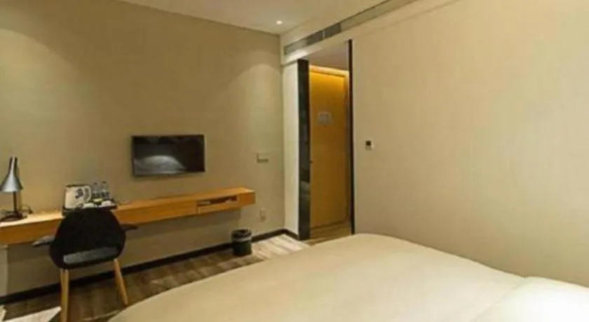 Bed in Borrman Hotel Jingzhou Jiangjin West Road Wanda Plaza Fantawild