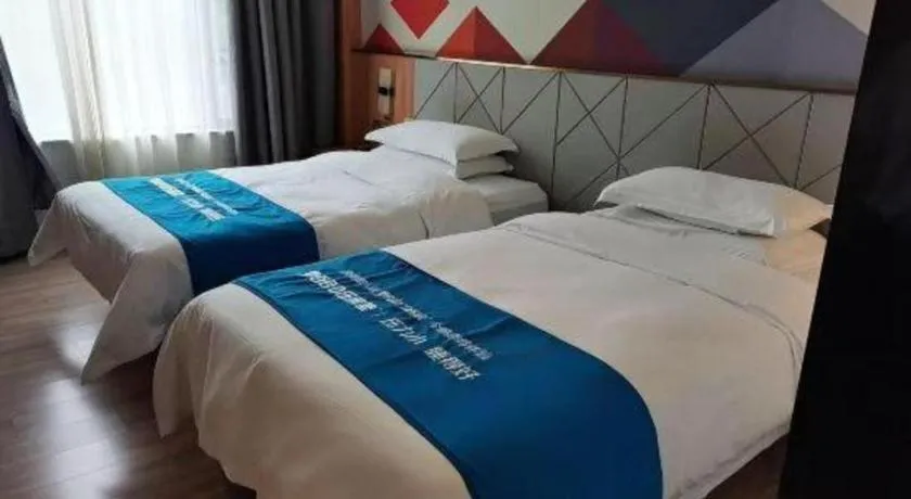 Bed in Borrman Hotel Jingzhou Jiangjin West Road Wanda Plaza Fantawild