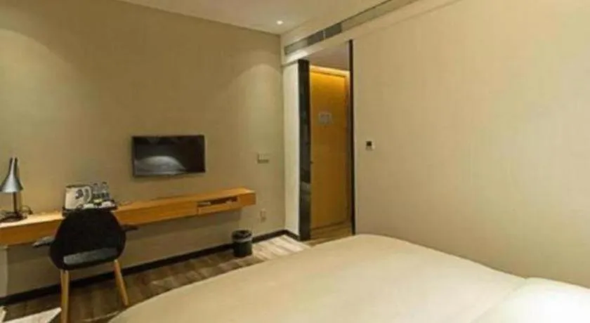 Bed in Borrman Hotel Jingzhou Jiangjin West Road Wanda Plaza Fantawild