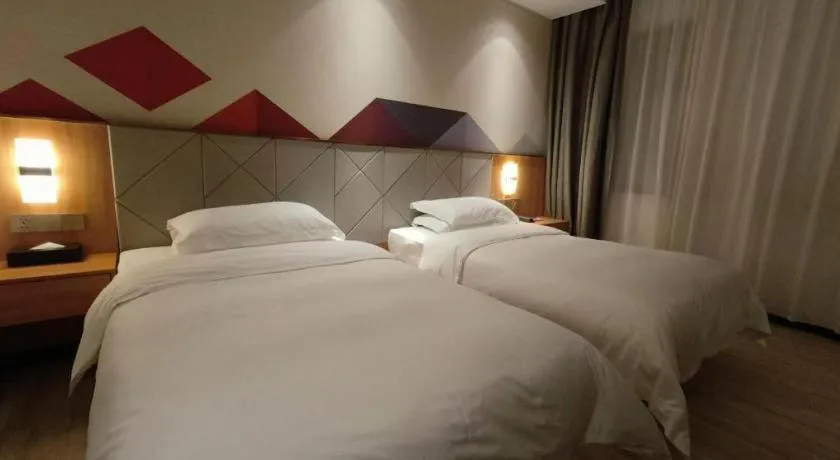 Bed in Borrman Hotel Jingzhou Jiangjin West Road Wanda Plaza Fantawild