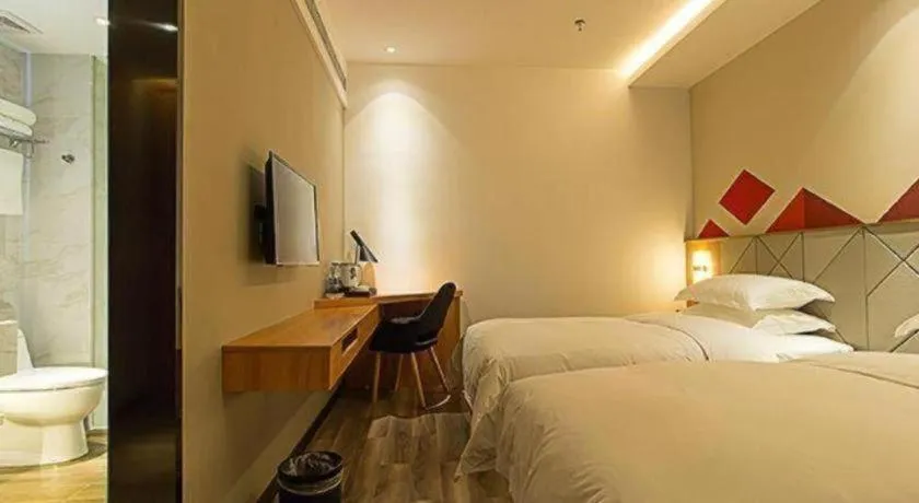 Bed in Borrman Hotel Jingzhou Jiangjin West Road Wanda Plaza Fantawild