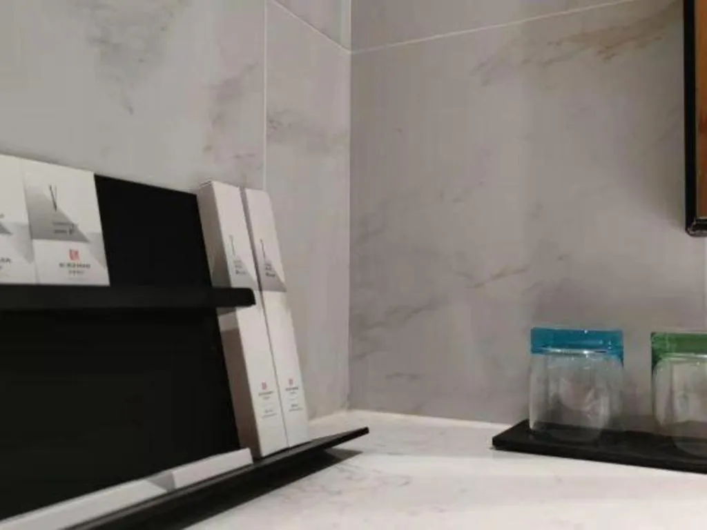 Bed in Borrman Hotel Jingzhou Jiangjin West Road Wanda Plaza Fantawild