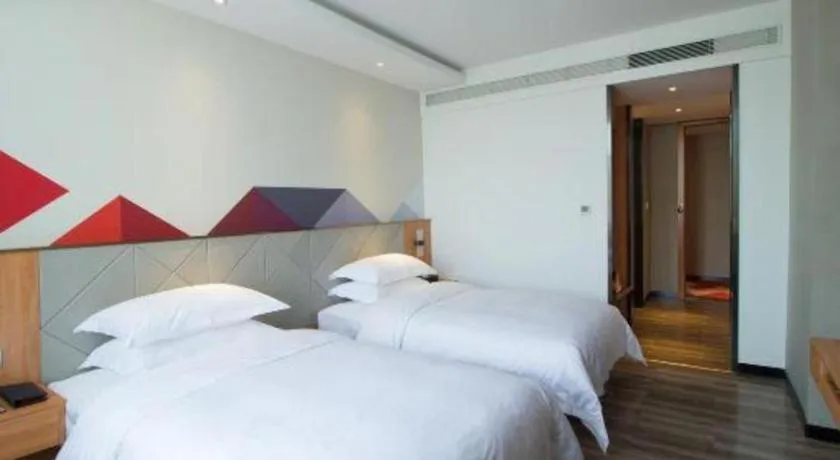 Bed in Borrman Hotel Jingzhou Jiangjin West Road Wanda Plaza Fantawild