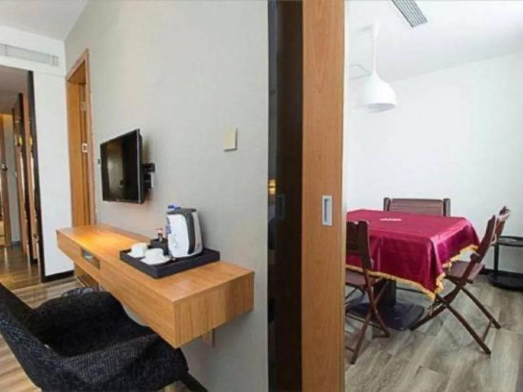 Bed in Borrman Hotel Jingzhou Jiangjin West Road Wanda Plaza Fantawild