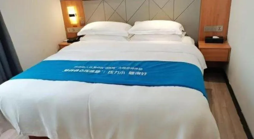 Bed in Borrman Hotel Jingzhou Jiangjin West Road Wanda Plaza Fantawild
