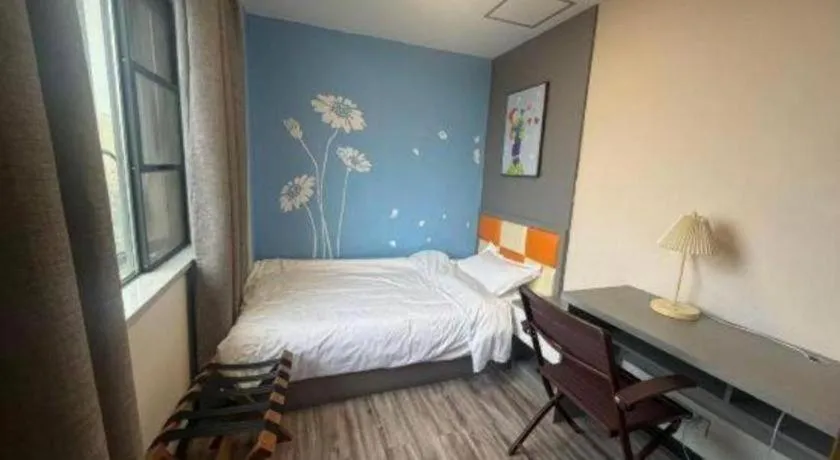 Bed in Borrman Hotel Jingzhou Jiangjin West Road Wanda Plaza Fantawild