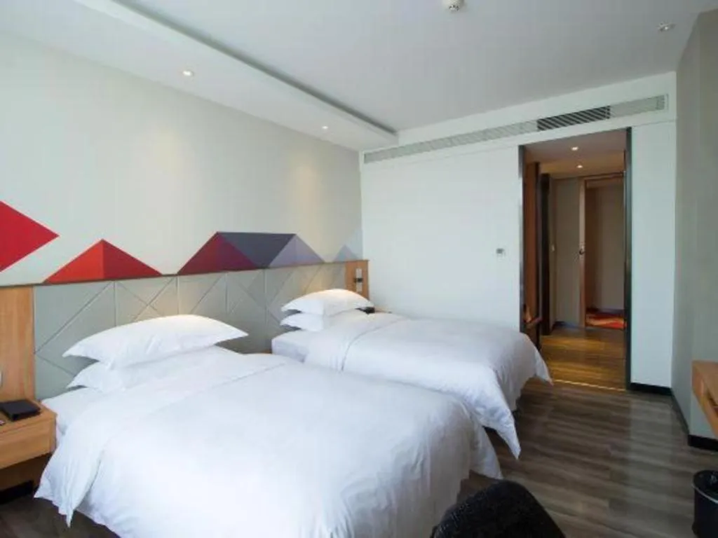 Bed in Borrman Hotel Jingzhou Jiangjin West Road Wanda Plaza Fantawild