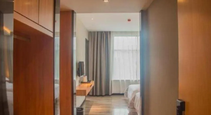 Bed in Borrman Hotel Jingzhou Jiangjin West Road Wanda Plaza Fantawild