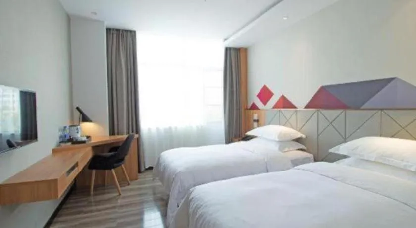 Bed in Borrman Hotel Jingzhou Jiangjin West Road Wanda Plaza Fantawild