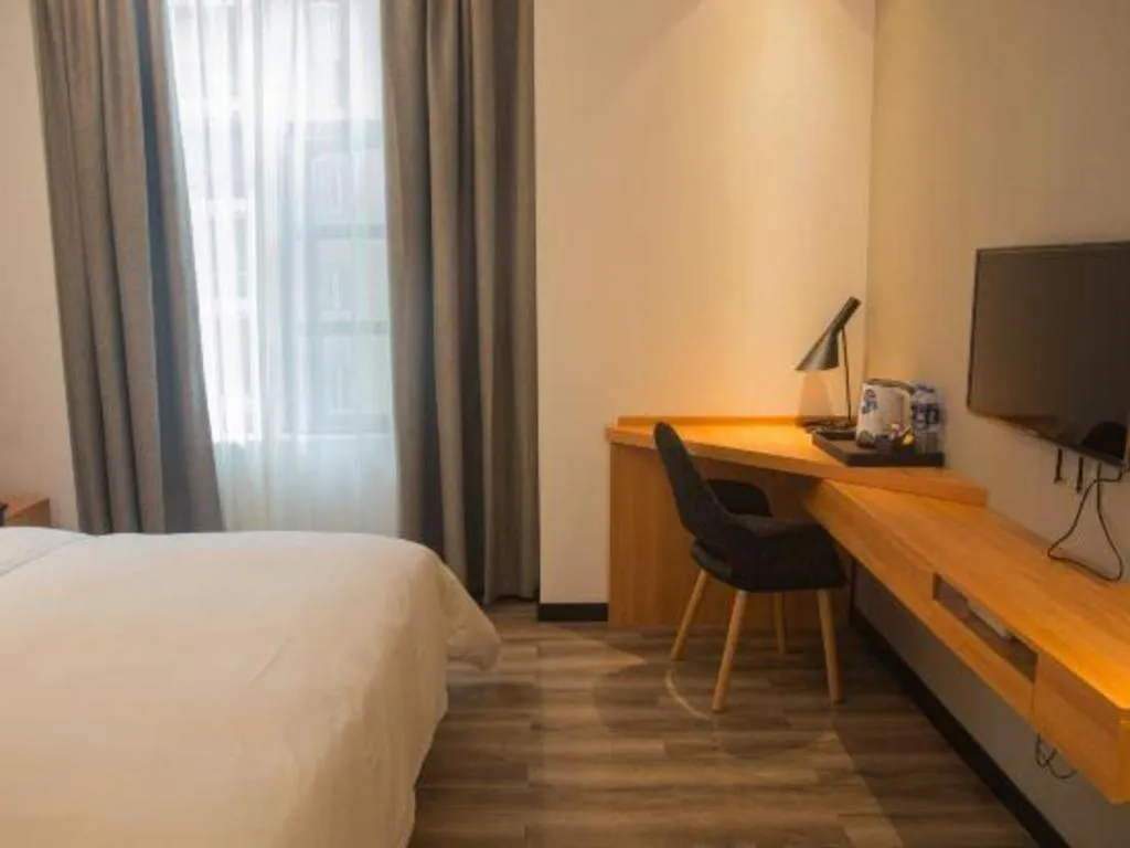 Bed in Borrman Hotel Jingzhou Jiangjin West Road Wanda Plaza Fantawild