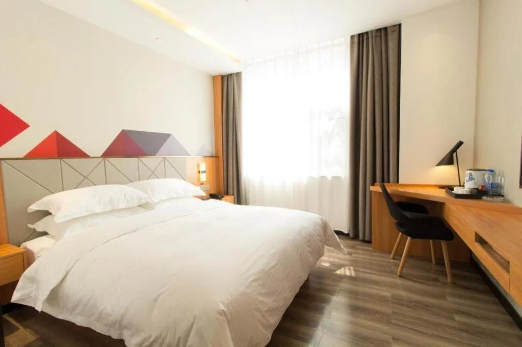 Bed in Borrman Hotel Jingzhou Jiangjin West Road Wanda Plaza Fantawild