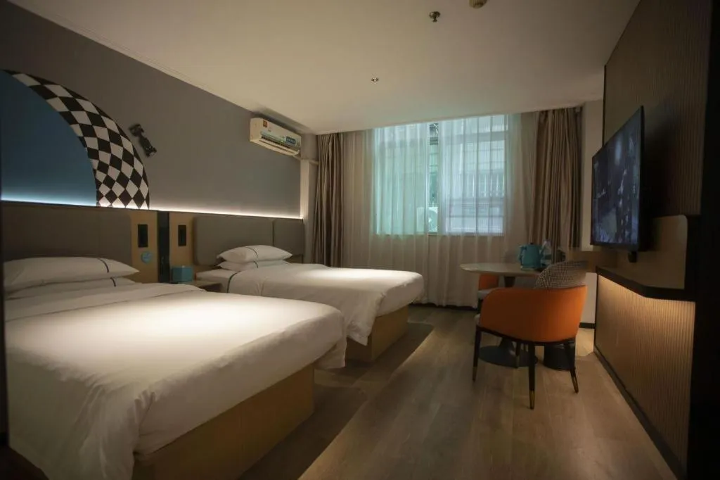 Bed in City Comfort Inn Guangzhou Dashi Metro Station Zoo Main Branch