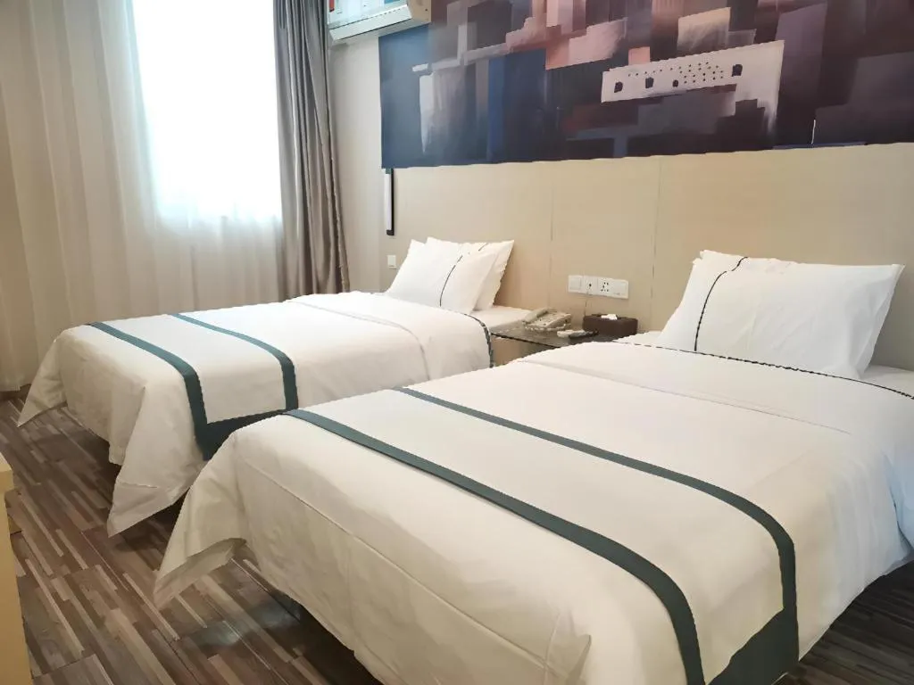 Bed in City Comfort Inn Guangzhou Dashi Metro Station Zoo Main Branch