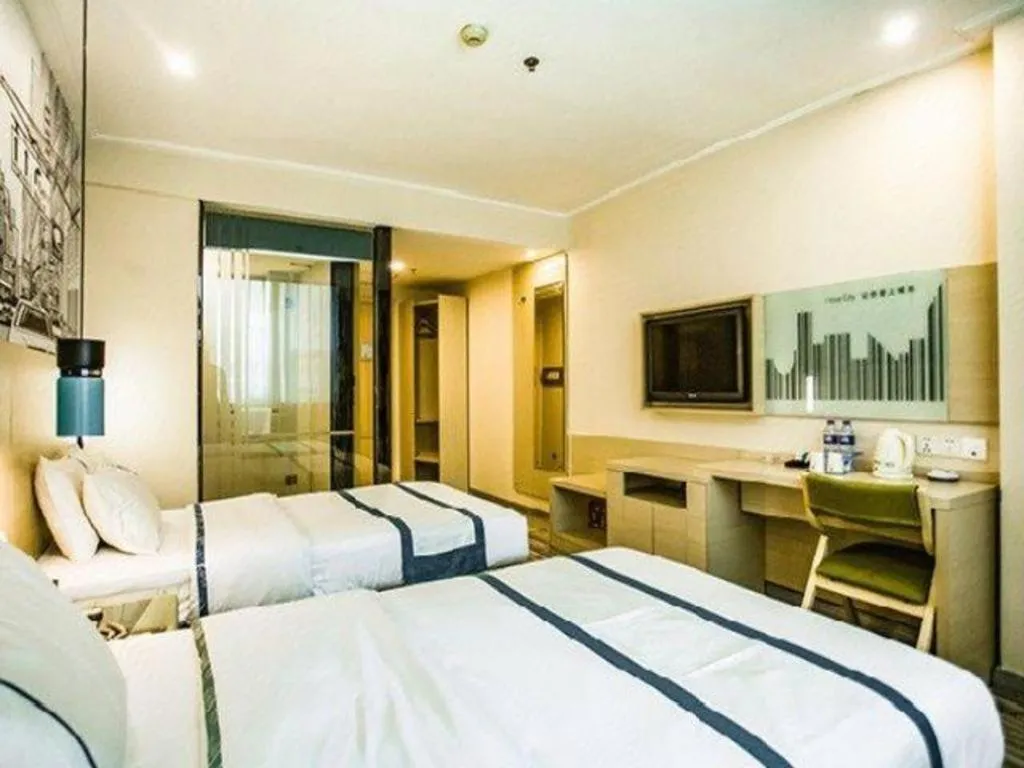 Bed in City Comfort Inn Guangzhou Dashi Metro Station Zoo Main Branch