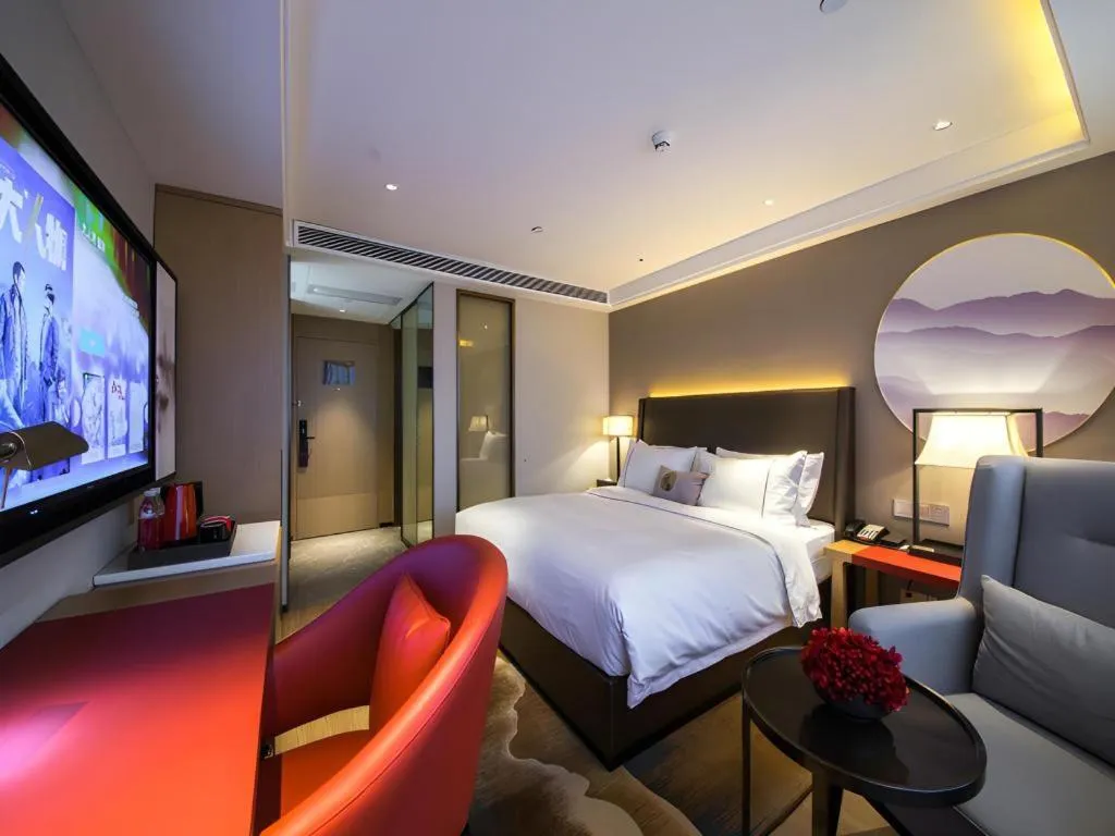 Bed in Echeng Hotel Changsha Evening News