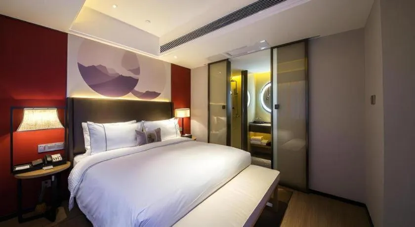 Bed in Echeng Hotel Changsha Evening News