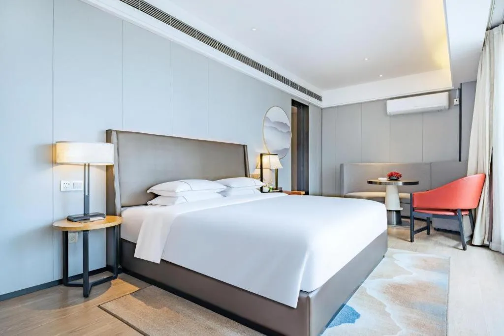 Bed in Echeng Hotel Changsha Evening News