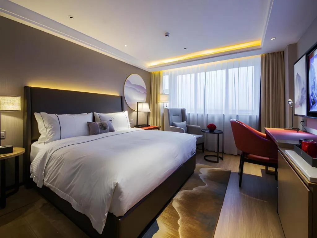 Bed in Echeng Hotel Changsha Evening News