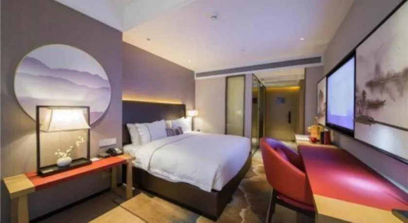 Bed in Echeng Hotel Changsha Evening News