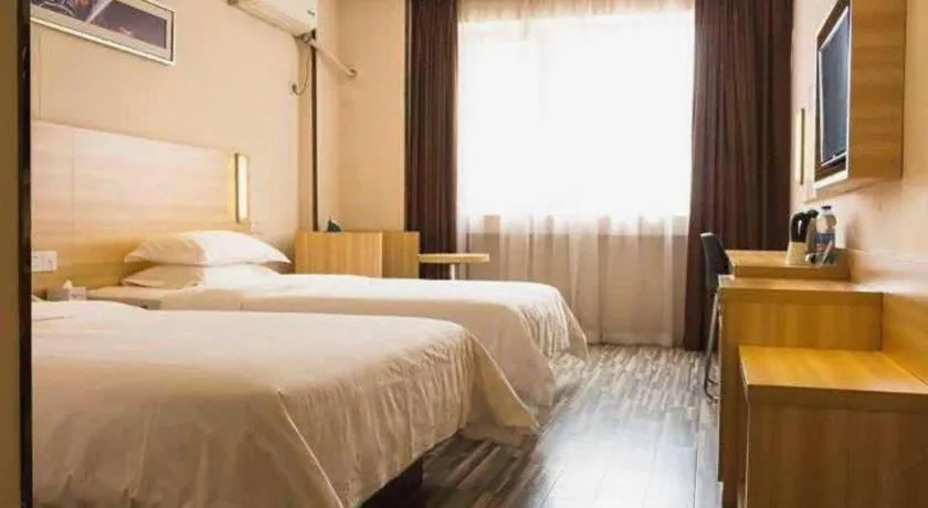 Bed in Jtour Inn Wuhan Hankou Railway East Plaza
