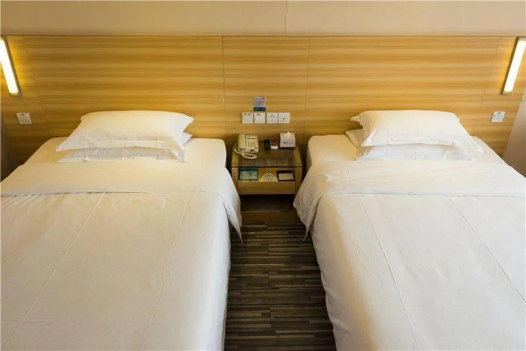 Bed in Jtour Inn Wuhan Hankou Railway East Plaza