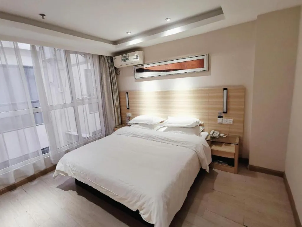 Bed in Jtour Inn Wuhan Hankou Railway East Plaza