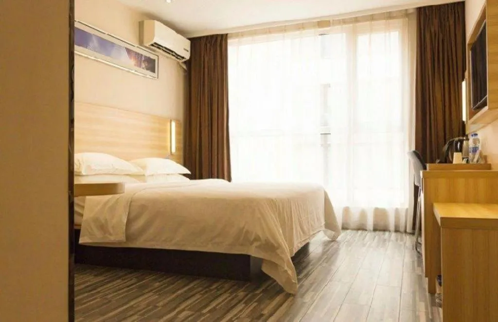 Bed in Jtour Inn Wuhan Hankou Railway East Plaza