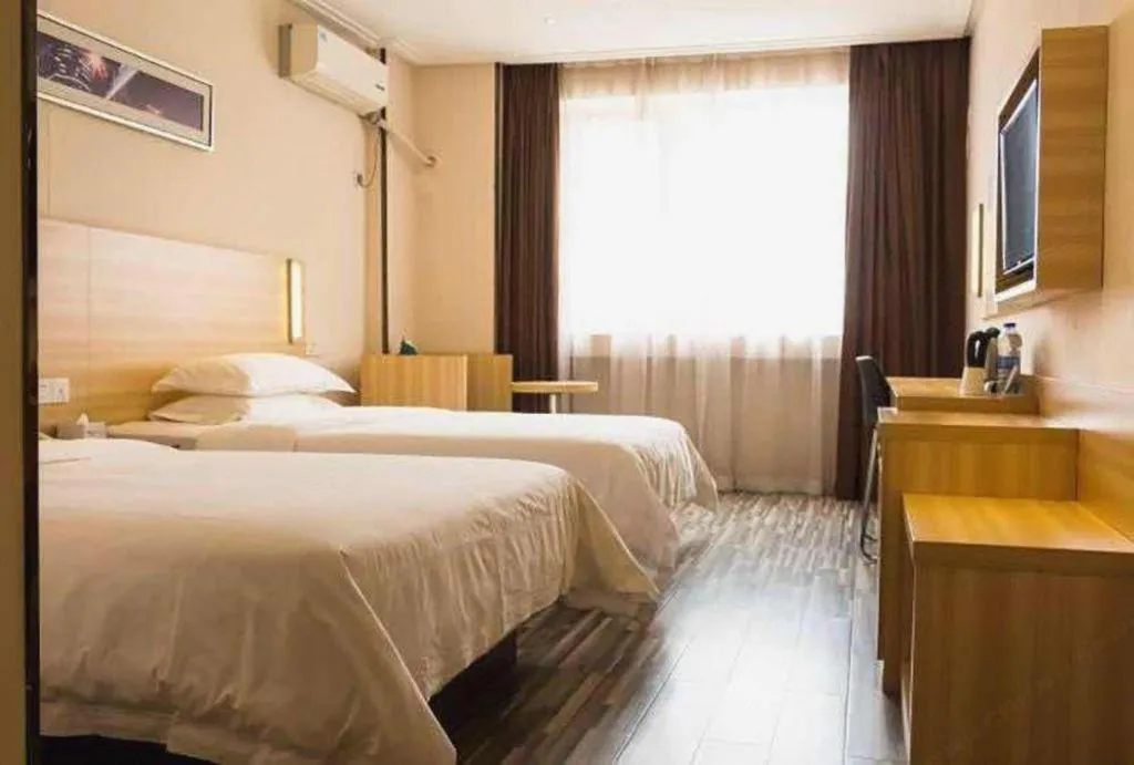 Bed in Jtour Inn Wuhan Hankou Railway East Plaza