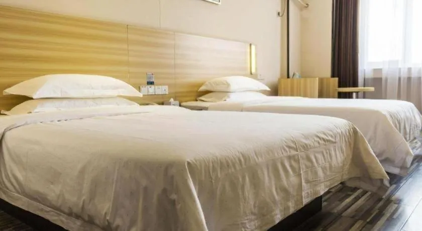 Bed in Jtour Inn Wuhan Hankou Railway East Plaza