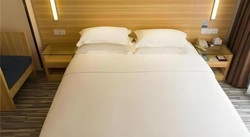 Bed in Jtour Inn Wuhan Hankou Railway East Plaza