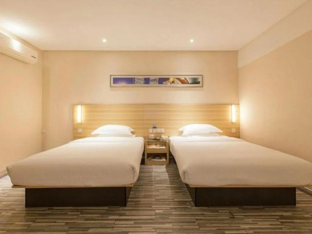 Bed in Jtour Inn Wuhan Hankou Railway East Plaza