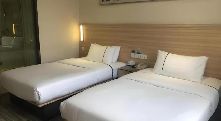 Bed in City Comfort Inn Wuhan Dongwu Avenue Light Rail Station