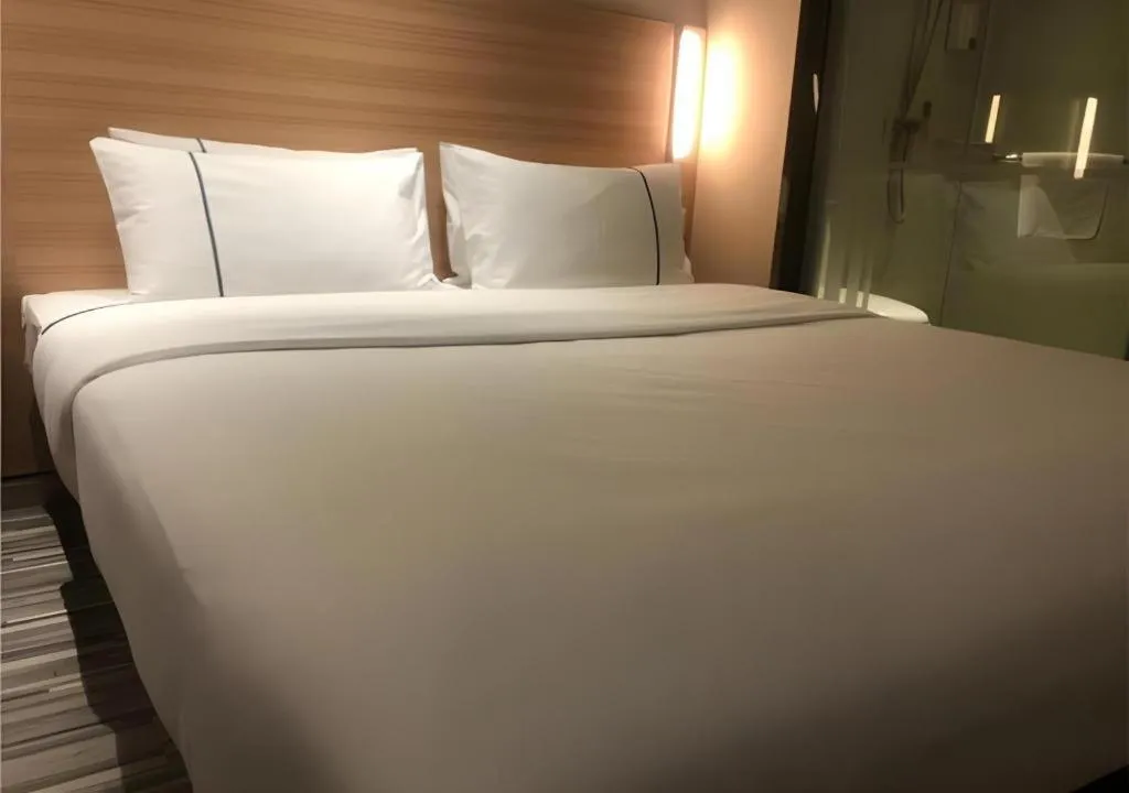 Bed in City Comfort Inn Wuhan Dongwu Avenue Light Rail Station