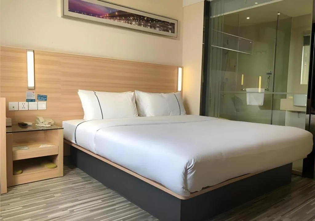 Bed in City Comfort Inn Wuhan Dongwu Avenue Light Rail Station