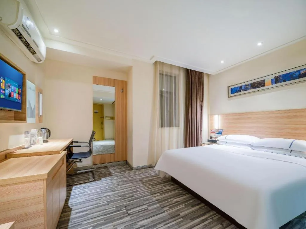 Bed in City Comfort Inn Wuhan Dongwu Avenue Light Rail Station