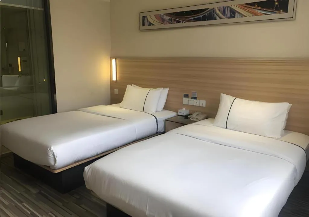 Bed in City Comfort Inn Wuhan Dongwu Avenue Light Rail Station