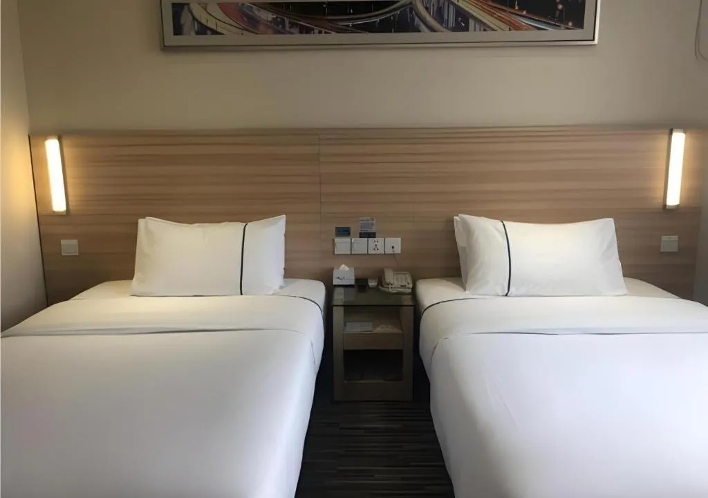 Bed in City Comfort Inn Wuhan Dongwu Avenue Light Rail Station